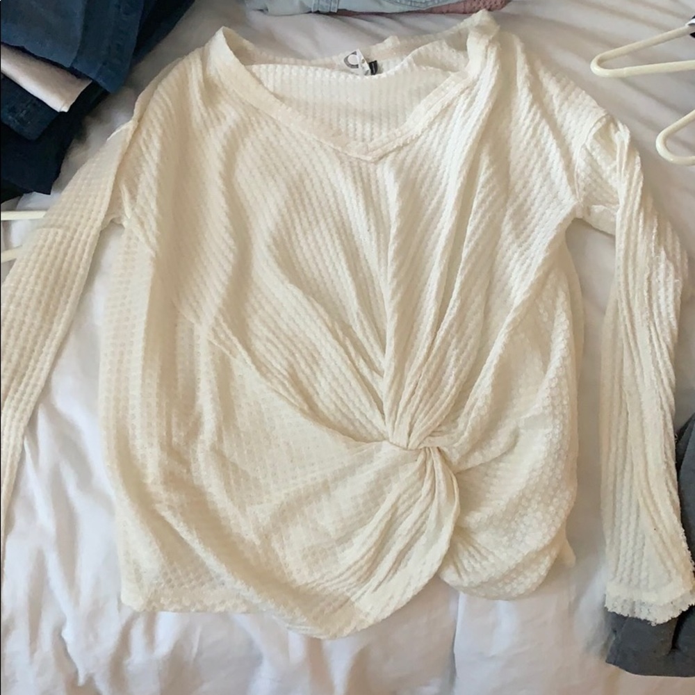 white knot sweater
